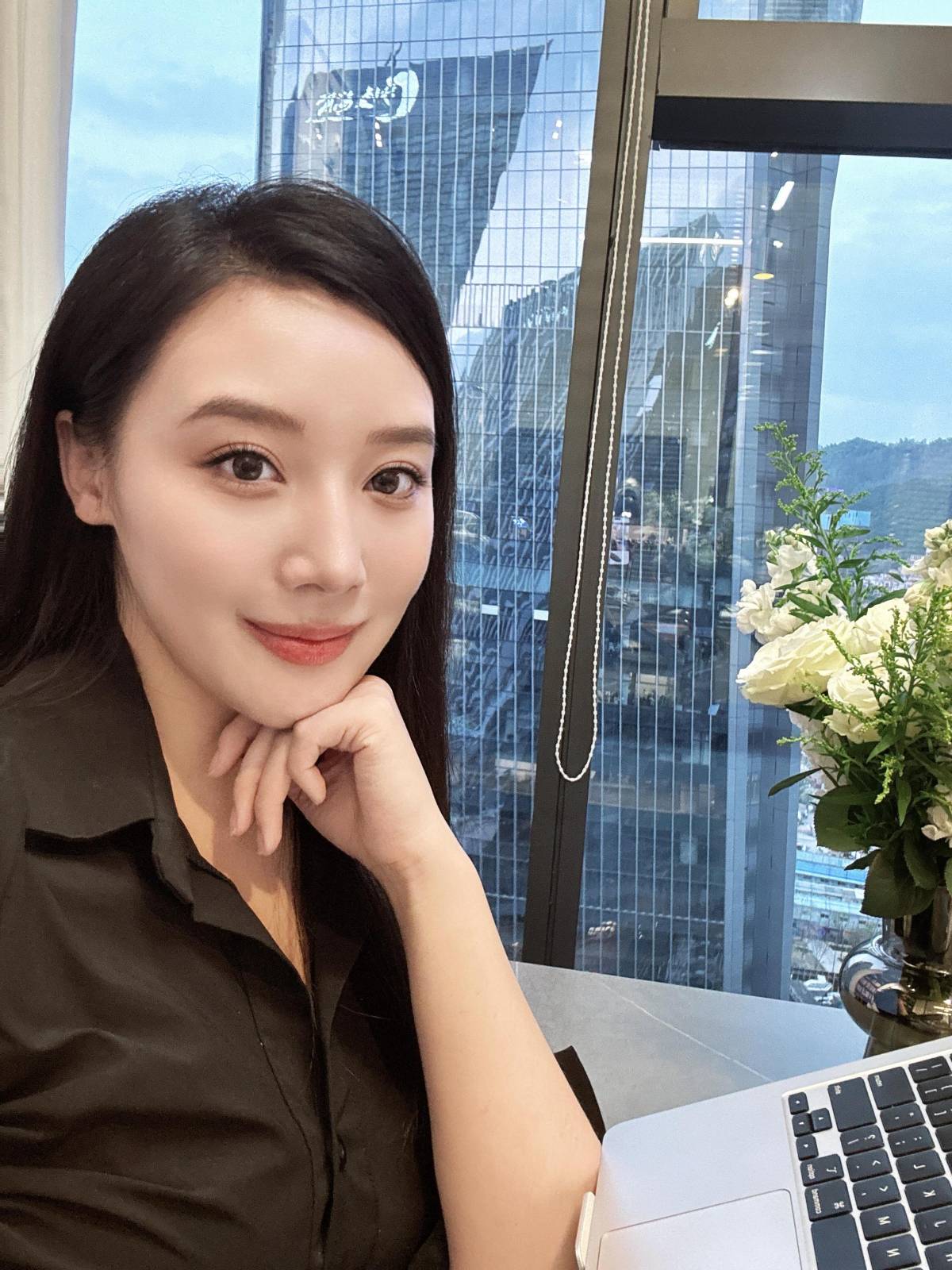 Laura in an office setting